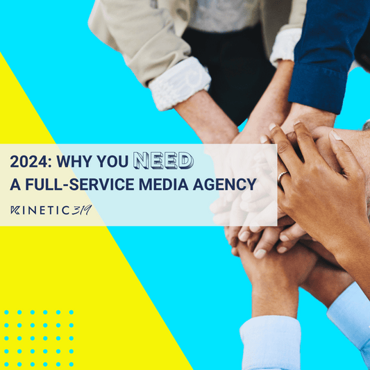 Group of hands stacking, signaling teamwork, set against a promotional background encouraging hiring a full-service media agency in 2024.